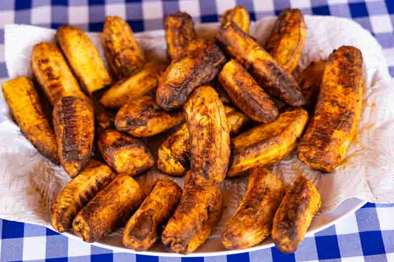 A generous portion of roasted ripe plantains, a traditional Colombian dish.