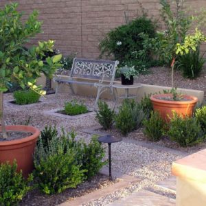 Garden ideas, Landscaping Ideas, Mediterranean garden, Mediterranean courtyard, terracota pots, gravel and stepping stones walkway, gravel and stepping stones path,boxwood,Studio H Landscape,container plants,formal,garden bench,geometric,geometry,gravel,g