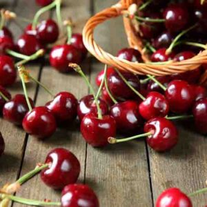 ripe cherry on a wooden table, food close up