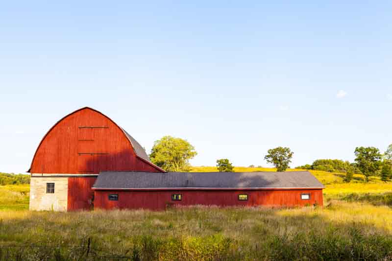 American Farmland With Blue Cloudy Sky